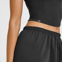 Mellow™ Rib Halter Neck Mid Vest with Built in Bra Shelf | Soft Black