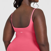 SoftMotion™ Strappy Vest with Built in Bra Shelf with White Logo | Dark Velvet Pink