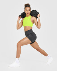 EasyLift™ High Neck Sports Bra with White Logo | Charged Lime Green