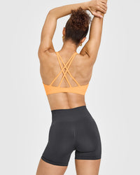 EasyLift™ High Neck Sports Bra with White Logo | Powdered Orange