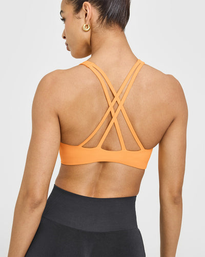 EasyLift™ High Neck Sports Bra with White Logo | Powdered Orange