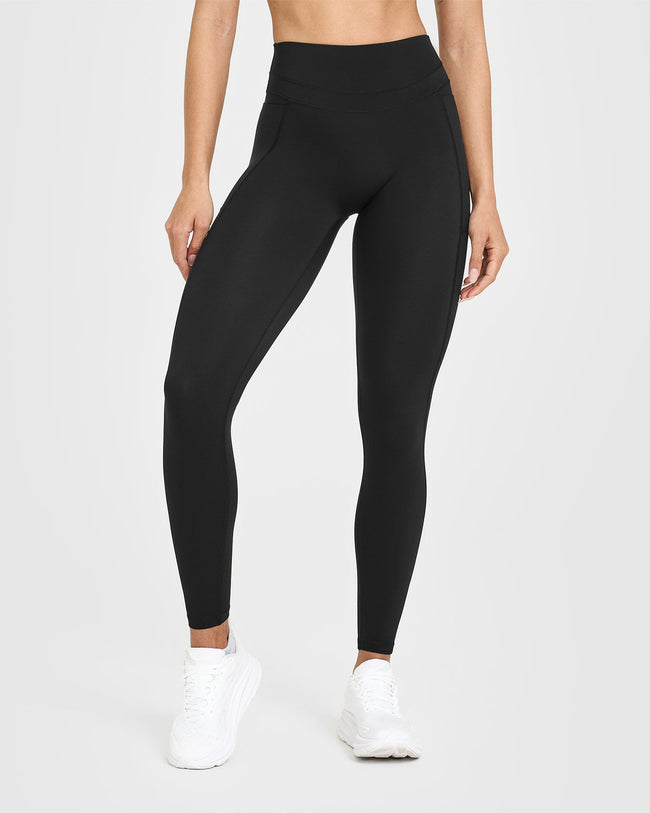Unified High Waisted Pocket Leggings White Logo | Black