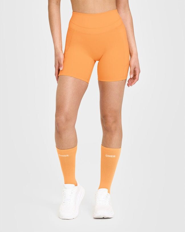 Unified High Waisted Pocket Shorts 6" | Powdered Orange