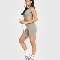 EasyLift™ High Neck Sports Bra with White Logo | Warm Sand