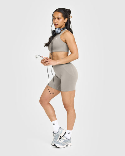 EasyLift™ High Neck Sports Bra with White Logo | Warm Sand