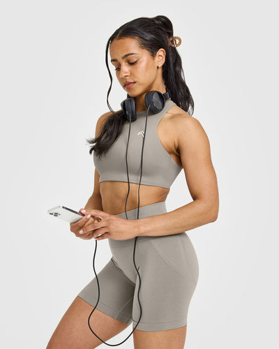 EasyLift™ High Neck Sports Bra with White Logo | Warm Sand