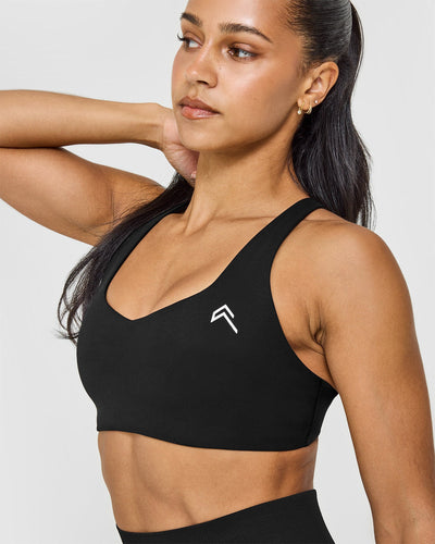 EasyLift™ Cross Back Sports Bra with White Logo | Black