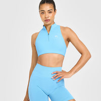 EasyLift™ Zip High Neck Sports Bra with White Logo | Arctic Blue
