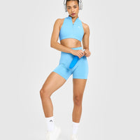 EasyLift™ Zip High Neck Sports Bra with White Logo | Arctic Blue