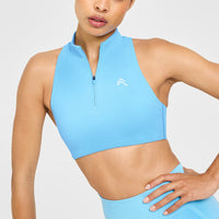 EasyLift™ Zip High Neck Sports Bra with White Logo | Arctic Blue