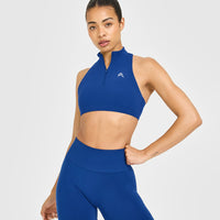 EasyLift™ Zip High Neck Sports Bra with White Logo | Vintage Navy