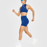 EasyLift™ Zip High Neck Sports Bra with White Logo | Vintage Navy