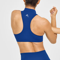EasyLift™ Zip High Neck Sports Bra with White Logo | Vintage Navy