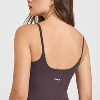 SoftMotion™ Strappy Mid Vest with Built in Bra Shelf with White Logo | Dark Umber Brown