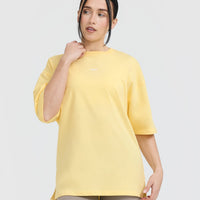 Raising The Bar Graphic Unisex T-Shirt | Sherbert Yellow