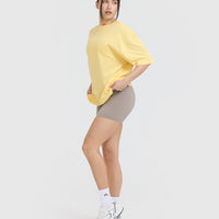 Raising The Bar Graphic Unisex T-Shirt | Sherbert Yellow