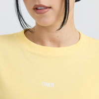 Raising The Bar Graphic Unisex T-Shirt | Sherbert Yellow