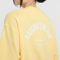 Raising The Bar Graphic Unisex T-Shirt | Sherbert Yellow