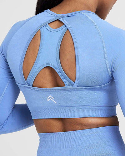 Effortless Seamless Long Sleeve Crop Top with White Logo | Light Denim