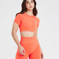 Effortless Seamless Short Sleeve Crop Top with White Logo | Peach Blossom