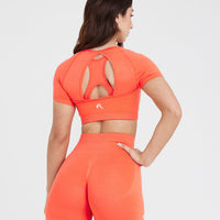 Effortless Seamless Short Sleeve Crop Top with White Logo | Peach Blossom