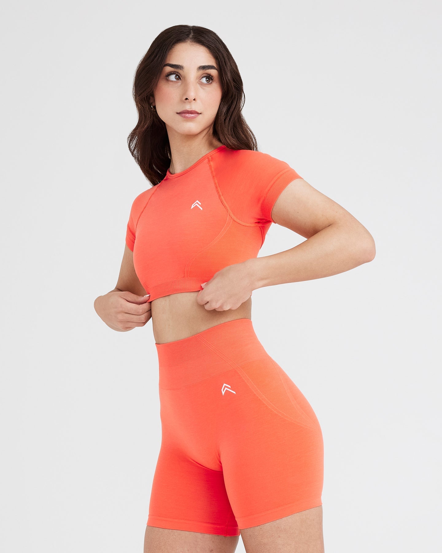 Effortless Seamless Short Sleeve Crop Top with White Logo | Peach Blossom