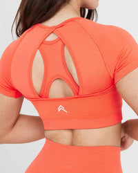 Effortless Seamless Short Sleeve Crop Top with White Logo | Peach Blossom