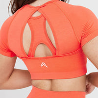 Effortless Seamless Short Sleeve Crop Top with White Logo | Peach Blossom