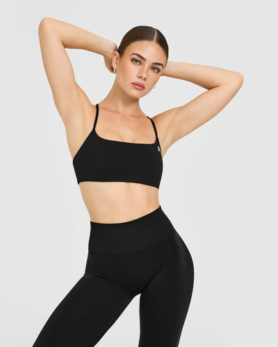 EasyLift™ Strappy Sports Bra with White Logo | Black