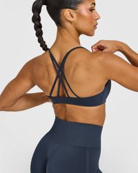 EasyLift™ Strappy Sports Bra with White Logo | True Blue