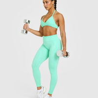 EnhanceLift™ Seamless Minimal Halter Neck Bralette with White Logo | Peppermint Green