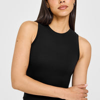 SoftMotion™ High Neck Mid Vest with White Logo | Black