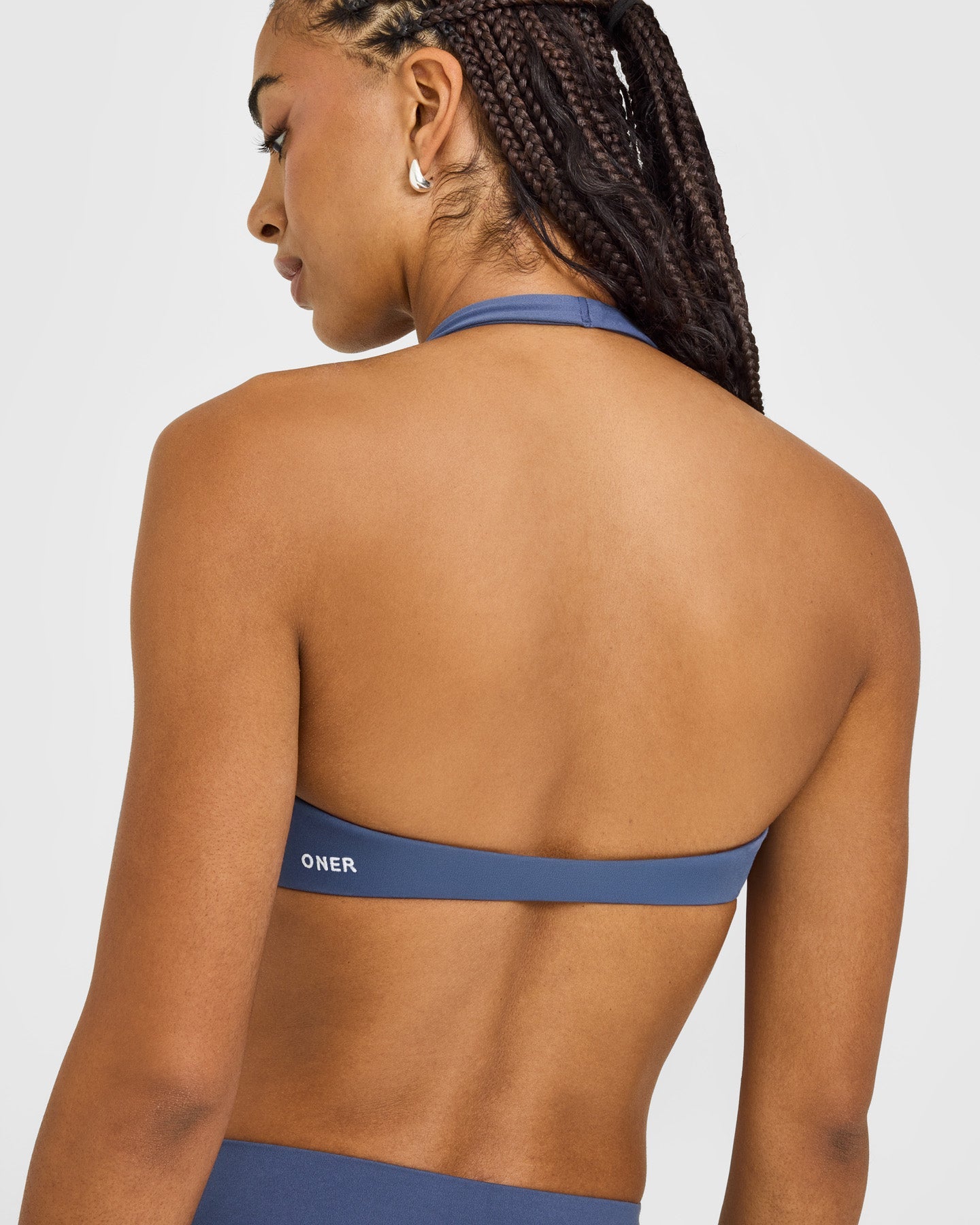 SoftMotion™ Minimal Halter Neck Bralette with White Logo | Slate Blue