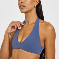 SoftMotion™ Minimal Halter Neck Bralette with White Logo | Slate Blue