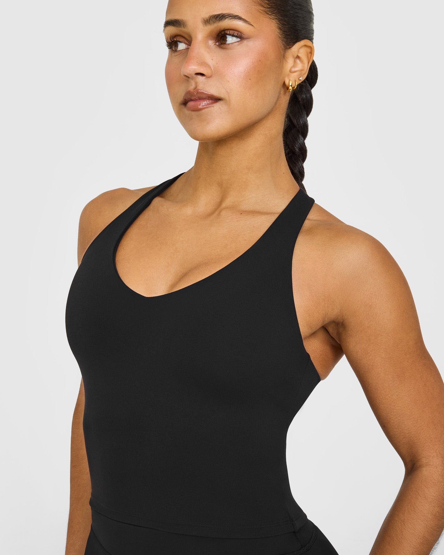 SoftMotion™ Racer Back Mid Vest with Built in Bra Shelf with White Logo | Black