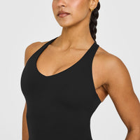 SoftMotion™ Racer Back Mid Vest with Built in Bra Shelf with White Logo | Black