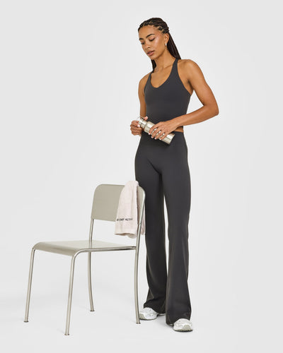 SoftMotion™ Racer Back Mid Vest with Built in Bra Shelf with White Logo | Coal