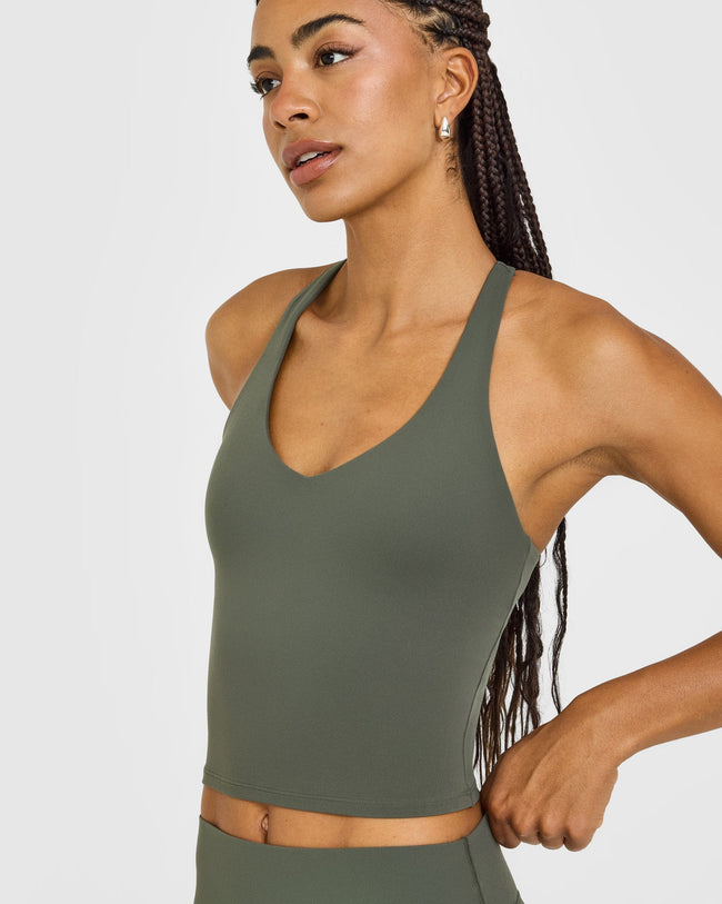 SoftMotion™ Racer Back Mid Vest with Built in Bra Shelf with White Logo | Dark Khaki