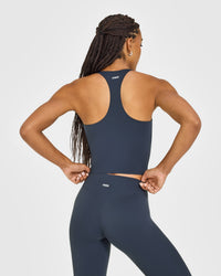 SoftMotion™ Racer Back Mid Vest with Built in Bra Shelf with White Logo | True Blue