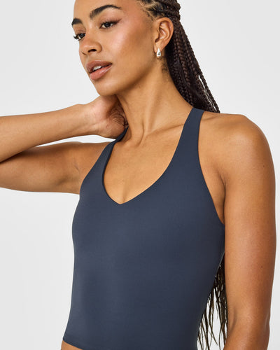 SoftMotion™ Racer Back Mid Vest with Built in Bra Shelf with White Logo | True Blue