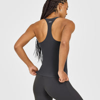 SoftMotion™ Racer Back Vest with Built in Bra Shelf with White Logo | Coal