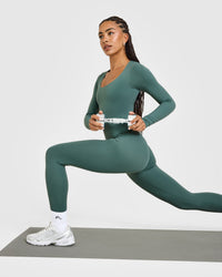 SoftMotion™ Scoop Neck Long Sleeve Top with Built in Bra Shelf with White Logo | Iced Green