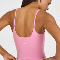 SoftMotion™ Strappy Mid Vest with Built in Bra Shelf with White Logo | Rose Pink