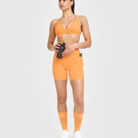 Unified High Waisted Pocket Shorts 6" | Powdered Orange