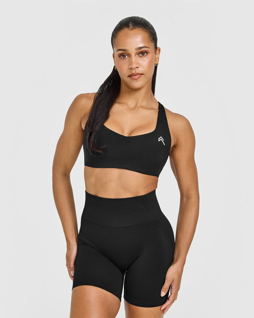 Oner Modal EasyLift™ Cross Back Sports Bra with White Logo | Black
