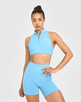 EasyLift™ Zip High Neck Sports Bra with White Logo | Arctic Blue