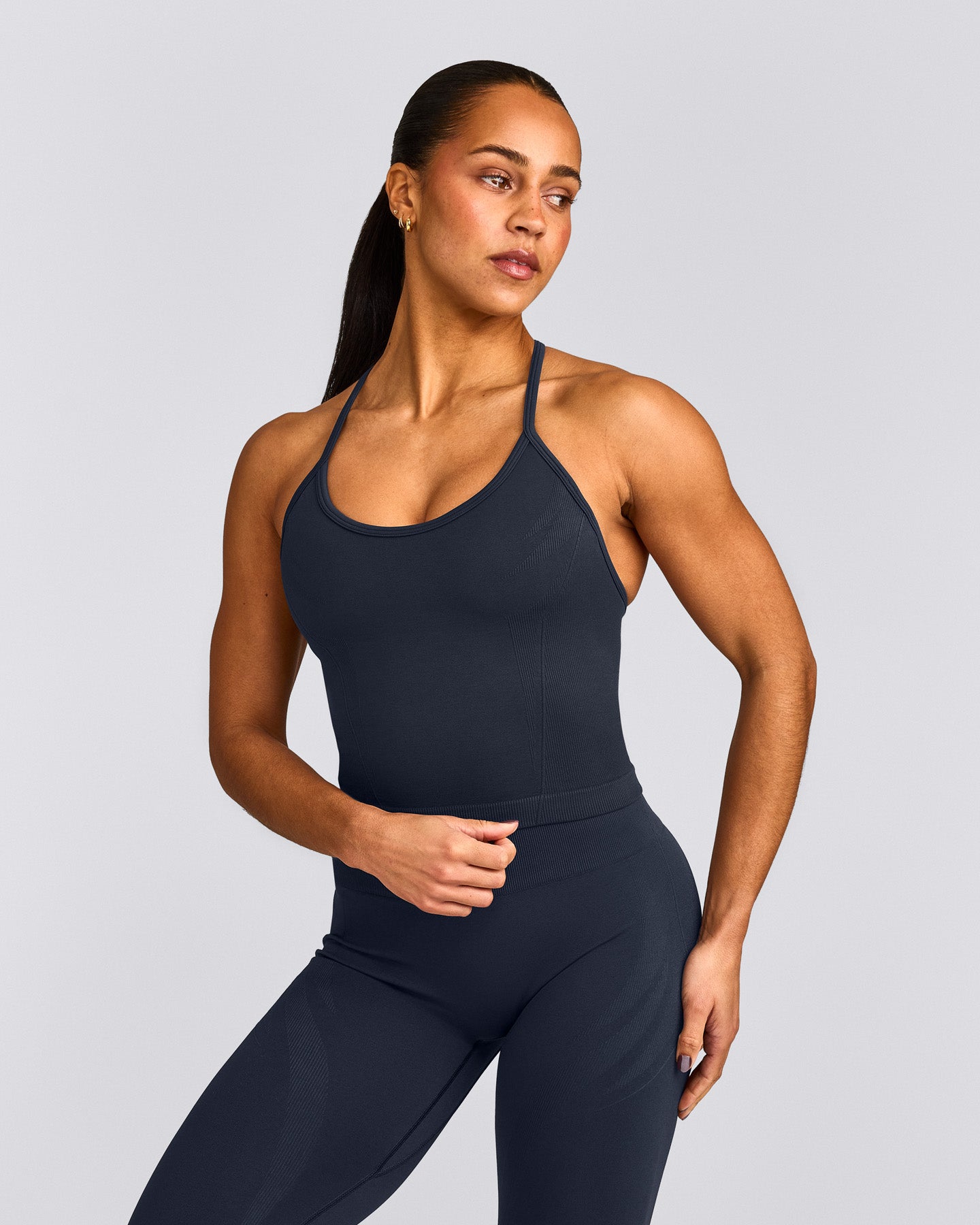 EnhanceLift™ Seamless Strappy Racer Tank Top with Built in Bra Shelf with Grey Logo | True Blue