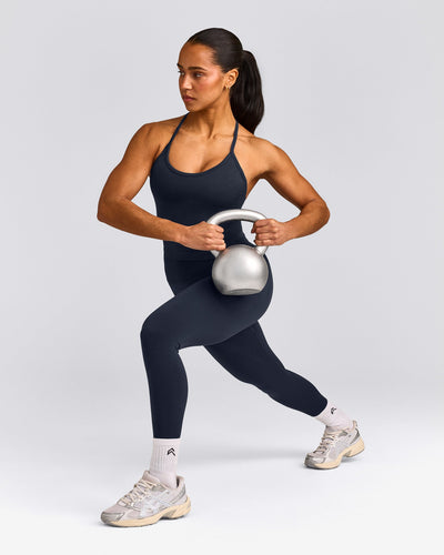 EnhanceLift™ Seamless Strappy Racer Tank Top with Built in Bra Shelf with Grey Logo | True Blue