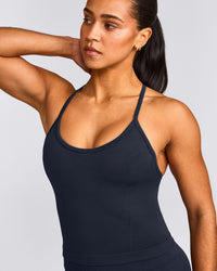 EnhanceLift™ Seamless Strappy Racer Tank Top with Built in Bra Shelf with Grey Logo | True Blue