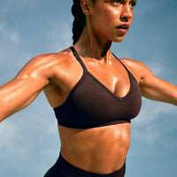 EnhanceLift™ Seamless Strappy Sports Bra with Grey Logo | 70% Cocoa